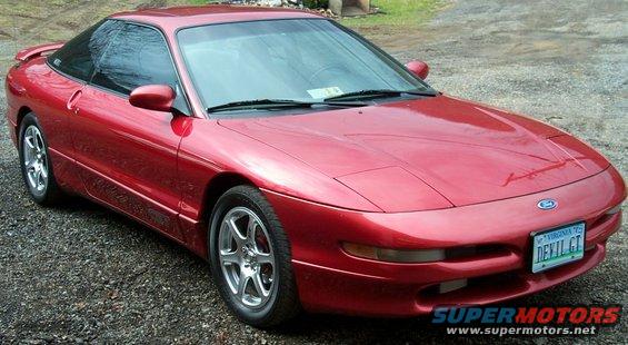 Red 1996 Ford Probe 3/4 front view