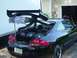 1999 Mercury Cougar - 1999 Mercury Cougar with custom subwoofers and a large rear spoiler installed.