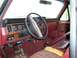 1984 Ford Bronco - New dash pad and ripped seats. Awesome.