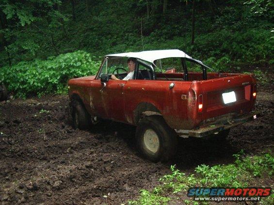 imgp0189.jpg Peter playing in some mud on the trail