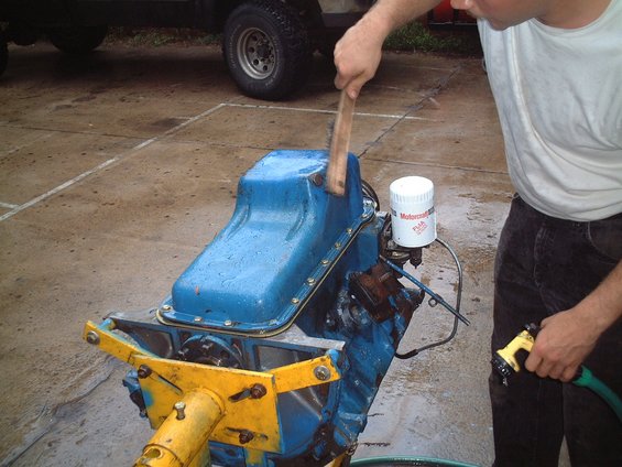 dscf0009.jpg Removing excess sludge and buildup.