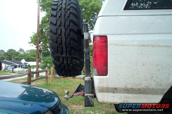 dcp_3161.jpg the tire carrier got deflected away from the tailgate from my friend hanging on the spare while trying to hook up two winch cables to the clevises.(Note the waterline) I believe it's the bearings that took the damage but haven't actually checked it. 