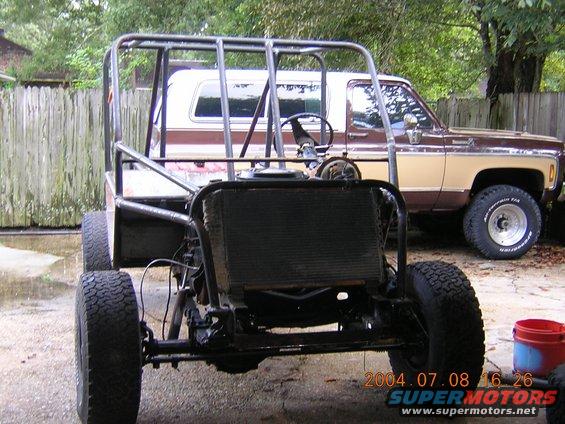 custom buggy frame in front of a 1973 Chevrolet K5 Blazer