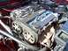 1992 Ford Probe - Close-up of an engine bay, showing the timing belt and engine cover with DOHC 16-VALVE text.