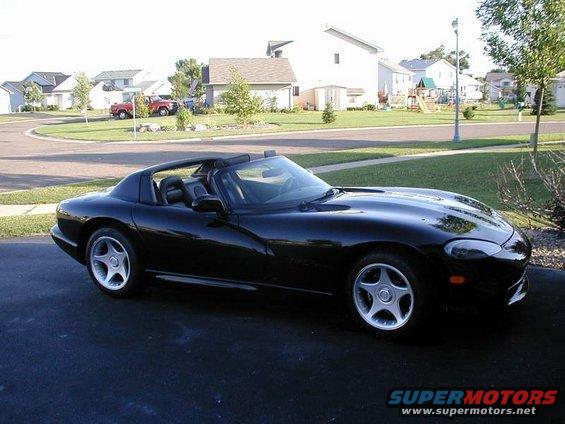 Black 1996 Dodge Viper convertible parked on driveway