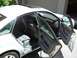 1999 Audi A6 - The interior of a silver Audi A6 is visible with all doors open, revealing the grey seats and wood trim details.
