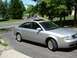 1999 Audi A6 - Silver 1999 Audi A6 sedan parked on a paved driveway.