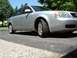 1999 Audi A6 - A silver sedan is shown from a low angle on a sunny day.