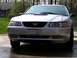 2000 Ford Mustang - Front view of a 2000 Ford Mustang parked outside a house.