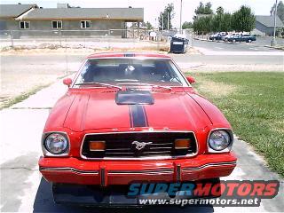Red 1970s Ford Mustang II front view with hood scoop