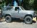1986 Ford Bronco - After the 8" front coils and a rear shackle flip.