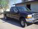 1999 Ford F-250 - This 1999 Ford F-250 Super Duty pickup truck is seen from the front three-quarter view.