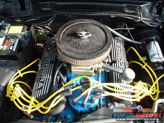 Engine bay with Cobra valve covers and yellow spark plug wires