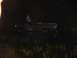 1989 Ford Bronco - Truck sits in dark water at night, with a person visible in the driver's seat.