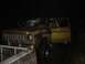 1989 Ford Bronco - This yellow SUV, likely from the mid-1970s, is shown at night with its doors ajar.
