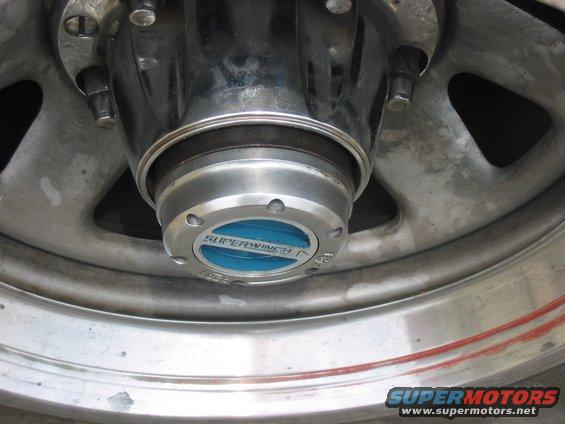 Close-up of a Superwinch manual hub on a wheel