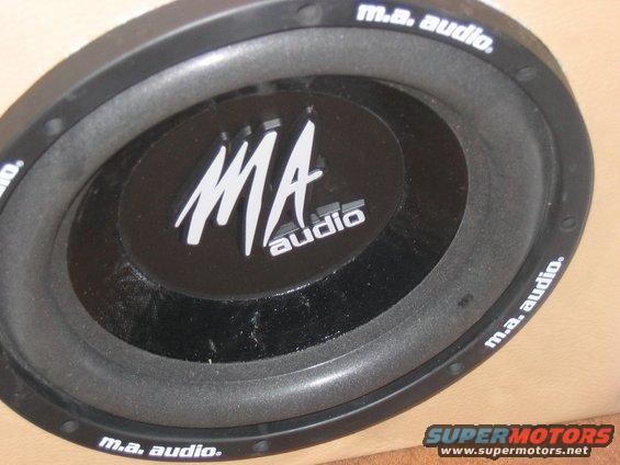 MA Audio subwoofer in a box, with text around the rim