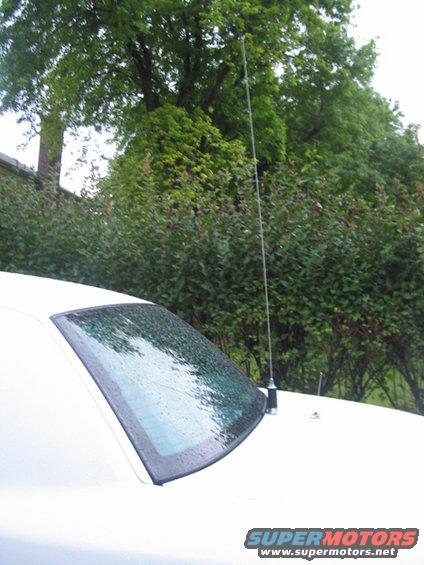 New Antenna by Antenex.  Stands little under 5 feet.  Trunk lid mount.