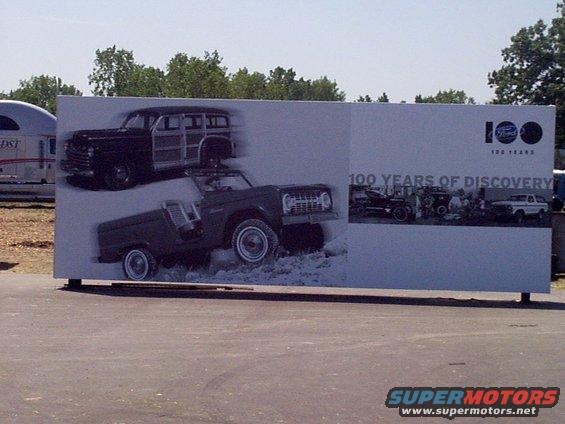 Ford 100 years of discovery display vintage Ford vehicles and text