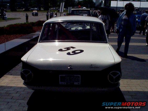 rear of white race car with black number 59 on trunk lid and license plate 2F5GD