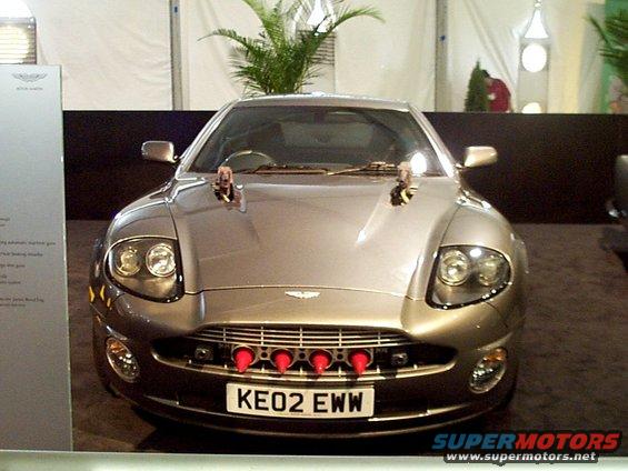Aston Martin Vanquish with license plate KE02 EWW and red cones on grille