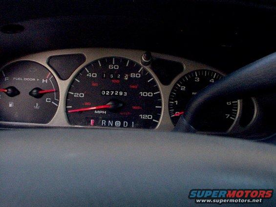 Speedometer reads 0, odometer shows 27,293 miles. Fuel and temperature gauges visible