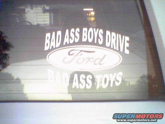 Rear window sticker says 'BAD ASS BOYS DRIVE Ford BAD ASS TOYS'
