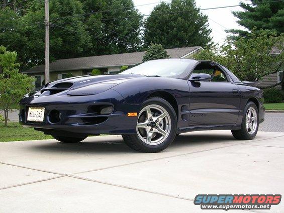 Dark blue 2000 Pontiac Trans Am parked on a driveway