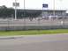 1990 Jeep YJ - Go-karts compete on a track with grandstands and tents visible.