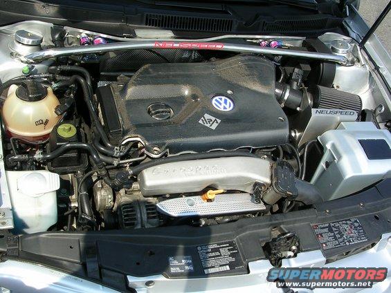 Engine bay with Volkswagen logo and Neuspeed intake