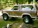 1984 Ford Bronco - This two-tone brown SUV displays a body style consistent with the early 1980s Ford Bronco generation.
