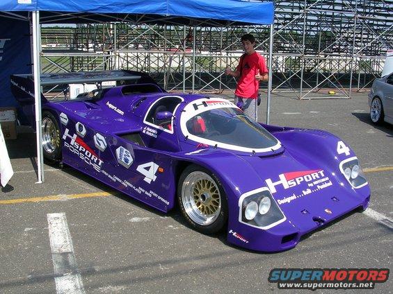 Purple racing car with HSPORT and Porsche decals, number 4 visible