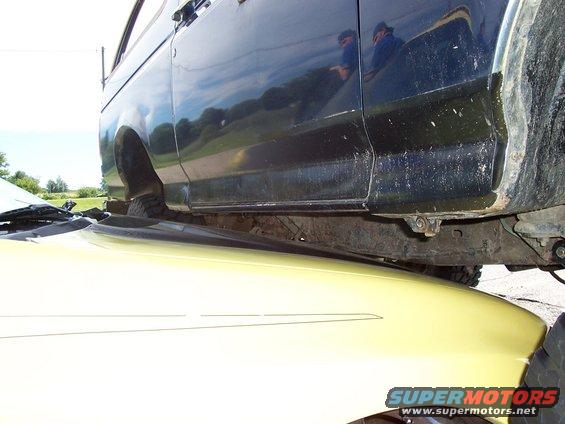 1989 Ford Bronco side view, showing the lower body panels and frame