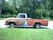 1954 Ford F-100 - This 1958 Ford F-100 pickup truck shows significant rust and primer patches along its body panels.