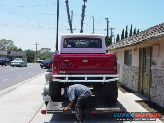 Red 1992 Ford Bronco rear view, 351 badge visible