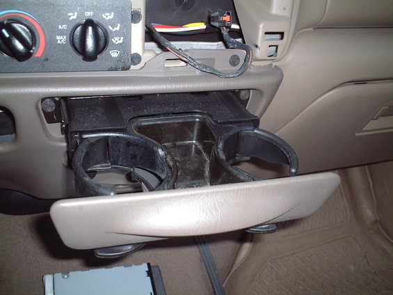dscf0024.jpg Must remove the cupholder (2 screws) before removing the lower dash panel.
