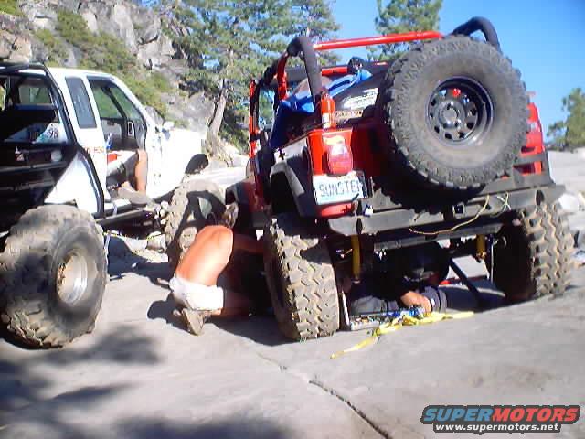 Little Sluce.

The Jeep busted a bolt holding on a traction bar causing the axle tube to turn and the driveshaft to break.