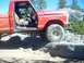 1976 Ford F-100 - This red pickup truck appears to be from the early to mid-1970s, not a 1976 model.