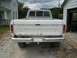 1979 Ford F-150 - Rear view of a white 1979 Ford F-150 pickup truck with a chrome bumper and Illinois license plate.