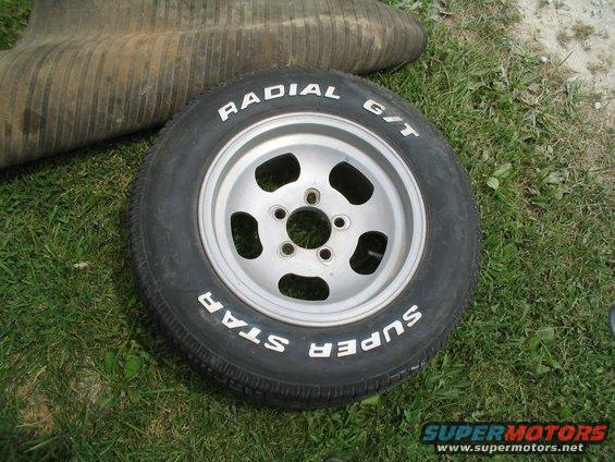 Tire and wheel assembly with "Radial G/T" and "Super Star" text