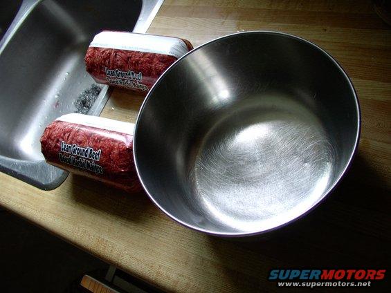 img_0058.jpg 4 lbs of lean ground beef (or whatever you snuffed).  At this point you can add a diced red onion, but too many of my buddy's wives won't let them back in the house after onion, so I usually don't.  Get her on the Barb-E !