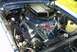 1967 Ford LTD - The engine bay of a blue car features a prominent black air cleaner with 'Cobra' branding and chrome valve covers.