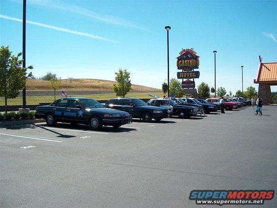 Black 2001 Ford Crown Victoria police car parked in a lot