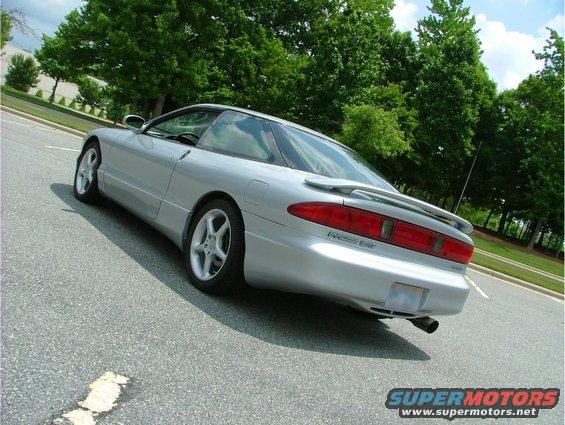 Silver 1995 Ford Probe parked on asphalt, rear view