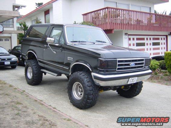 Black lifted 1990 Ford Bronco 3q-front view