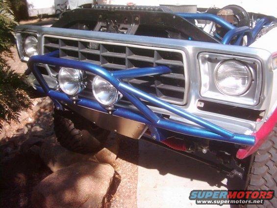 1978 Ford Bronco front end with custom blue roll cage bumper and auxiliary lights