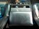 1994 Ford Bronco - Center console with a Tuffy lockbox and aftermarket radio installed.