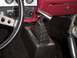 1978 Ford Mustang II - Interior view of a 1978 Ford Mustang II, highlighting the floor-mounted shifter and dashboard details.