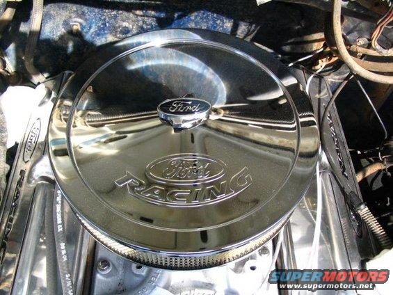 Chrome Ford Racing air cleaner on engine with Ford logo