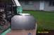 1996 Ford Bronco - Generator with wheels and engine is loaded into the bed of a green truck.